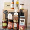 A picture of sauces and prepackaged edible gifts.
